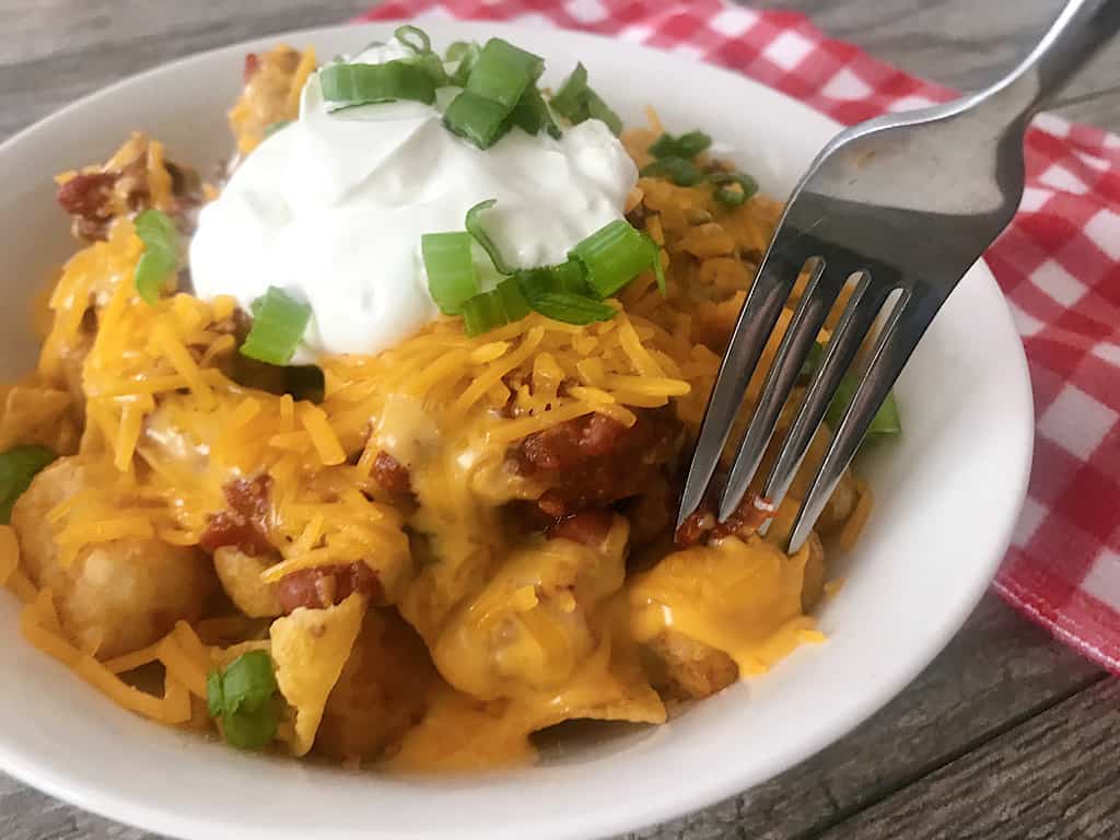 A fork and a bowl of Disney World Totchos