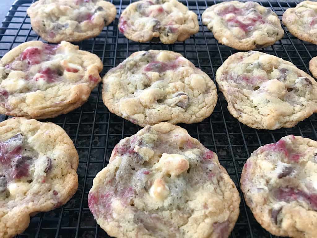 Raspberry White Chocolate Chip Cookies on a cooling rack