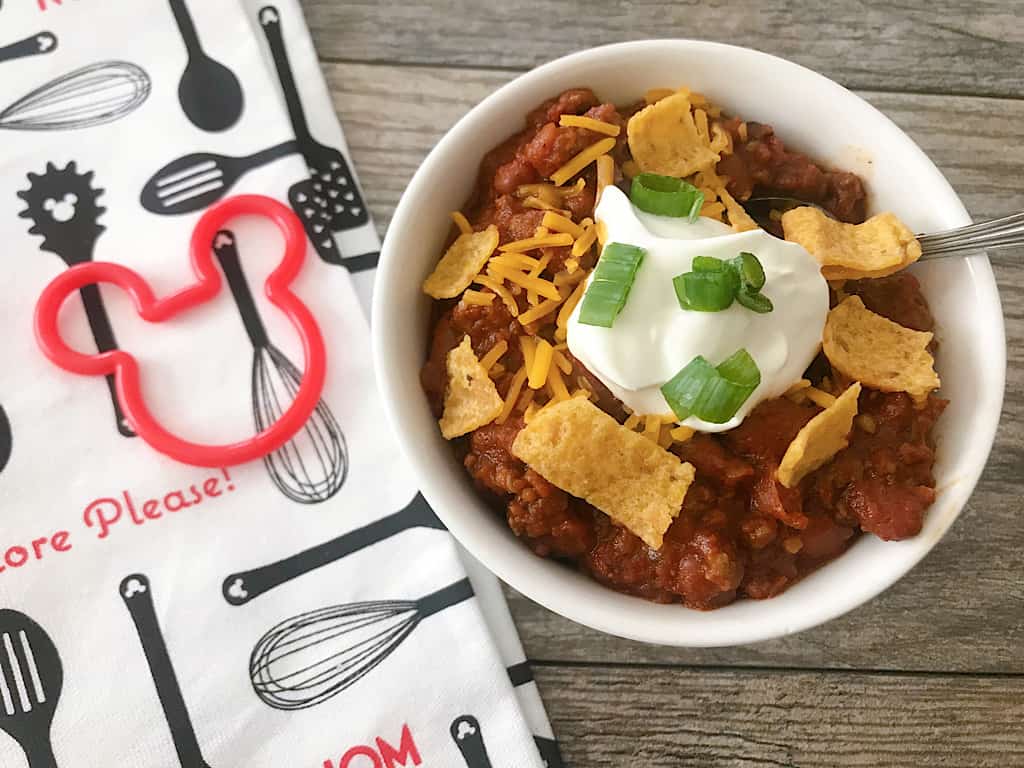 The recipe for Chili served over "Totchos" from Woody's Lunchbox in Walt Disney World! A hearty bowl of chili made in 30 minutes.