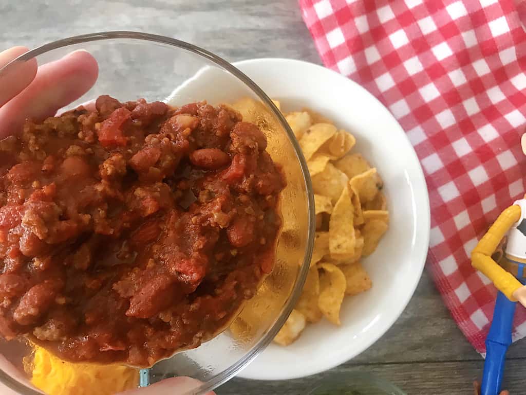 While the tater tots are cooking, prepare the Disney World Chili or warm up a can of your favorite chili.
