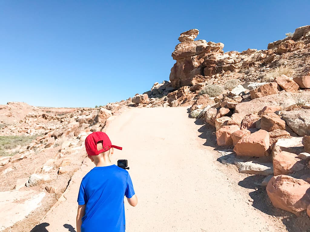 Kids on a hike to Delicate Arch