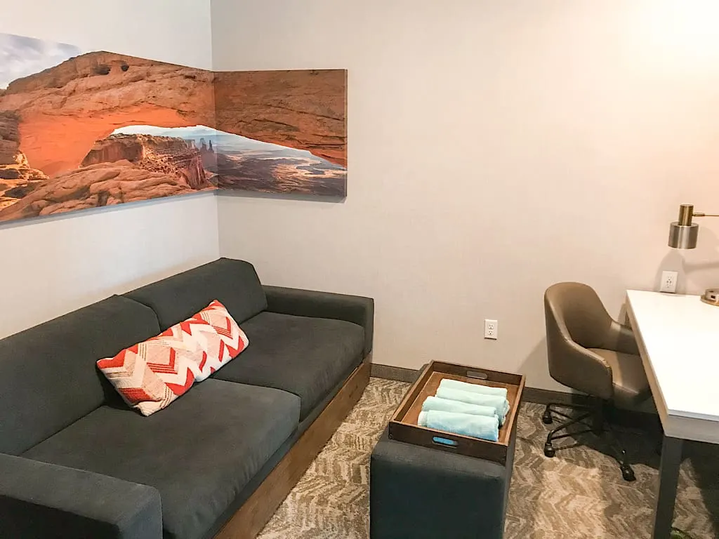 Sitting area of a 2 Queen Suite at Springhill Suites in Moab, Utah