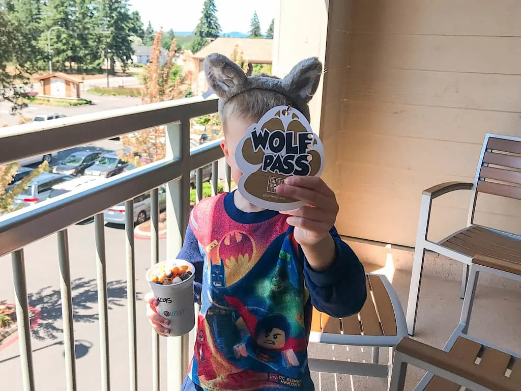 A boy with wolf ears and a wolf pass at Great Wolf Lodge