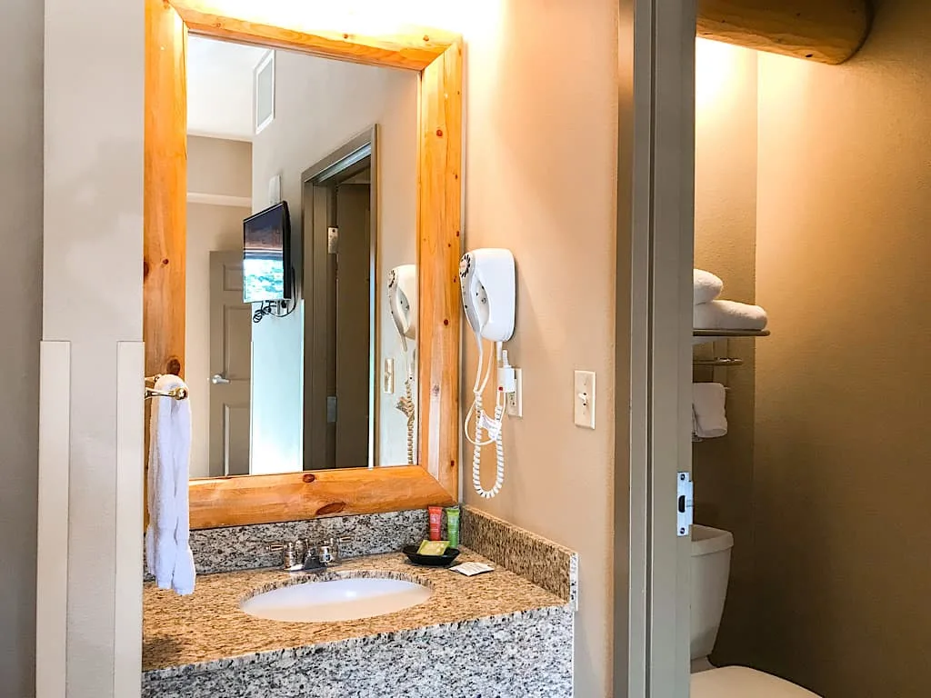 Vanity and half bath in Grand Bear Suite at Great Wolf Lodge Washington