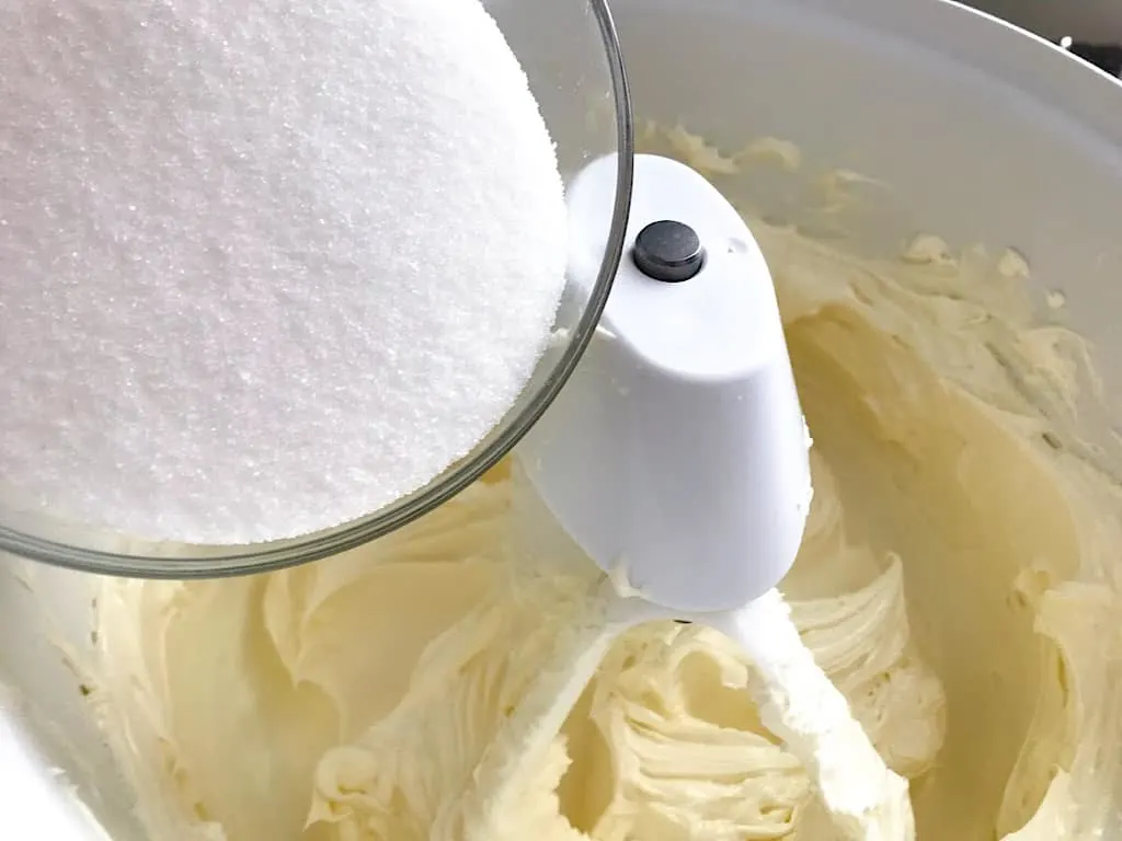 Add  the softened cream cheese to the bowl of a stand mixer