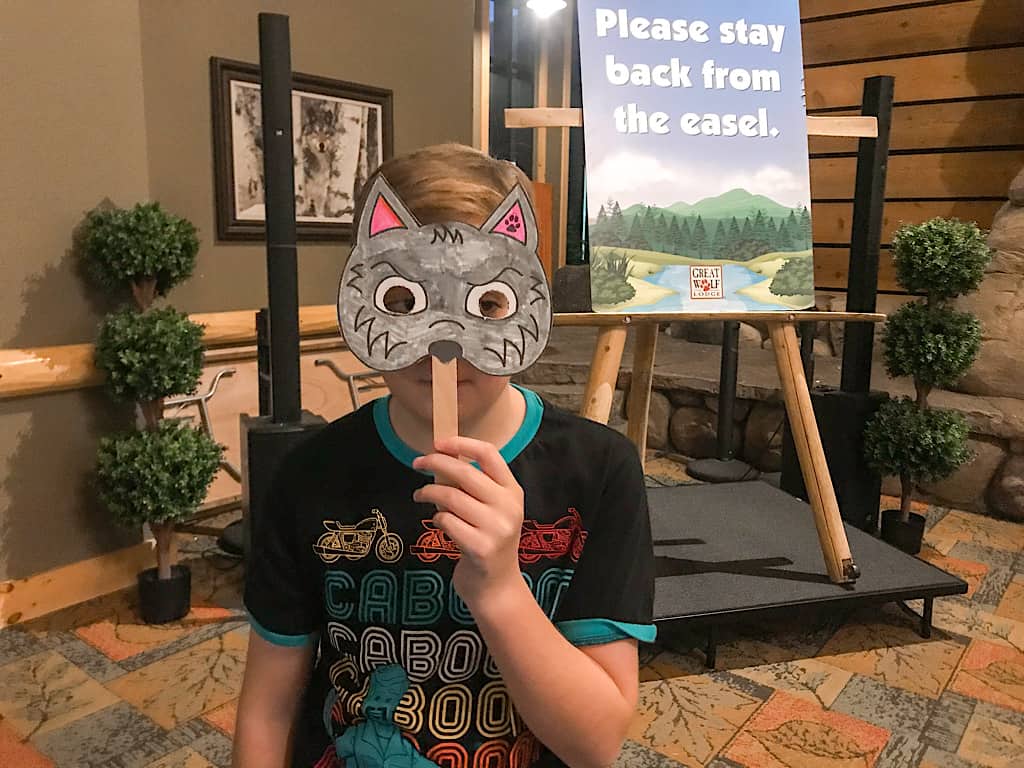 A boy with an art project at Great Wolf Lodge