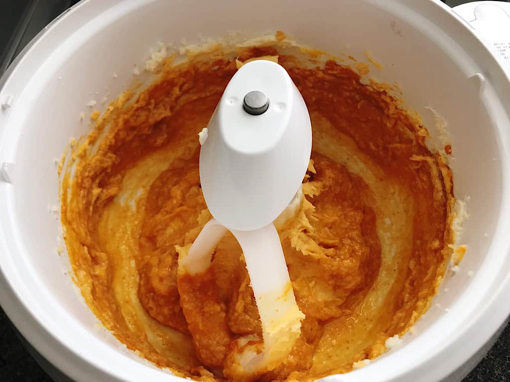 Pumpkin Mixture in a stand mixer for pumpkin spice sugar cookies