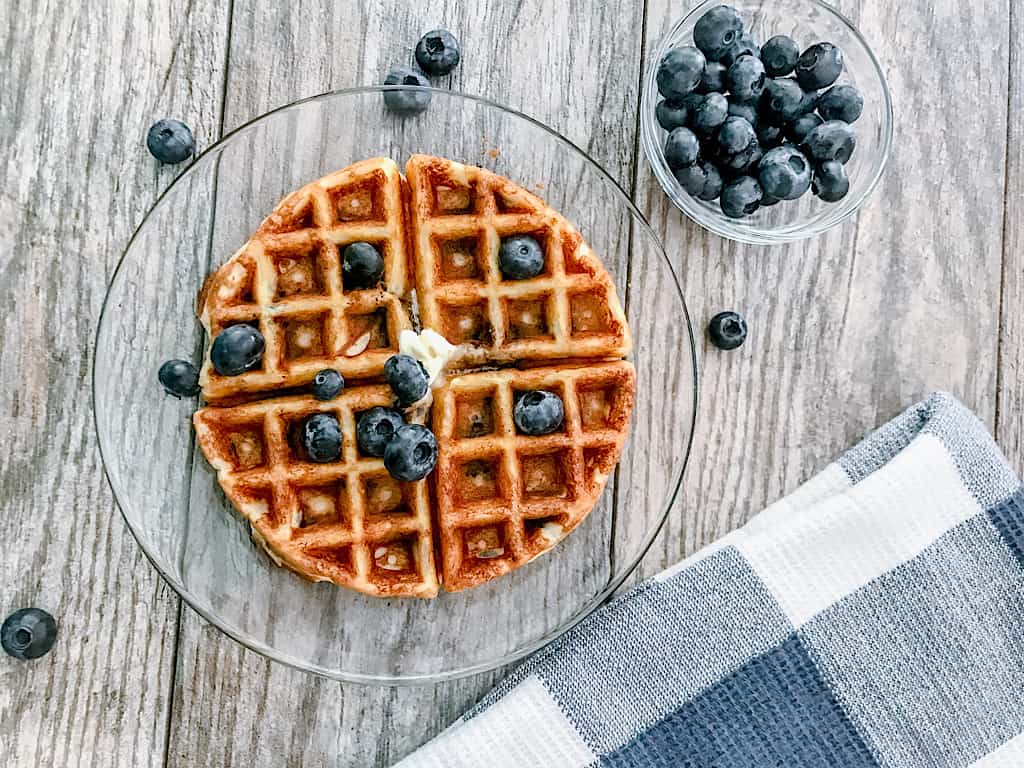 A low carb waffle with a side of blueberries