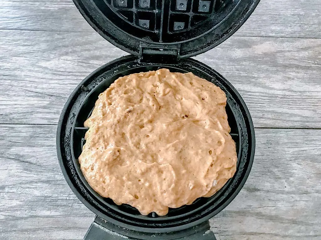 Scoop batter onto a preheated waffle iron sprayed with cooking spray and bake until golden.