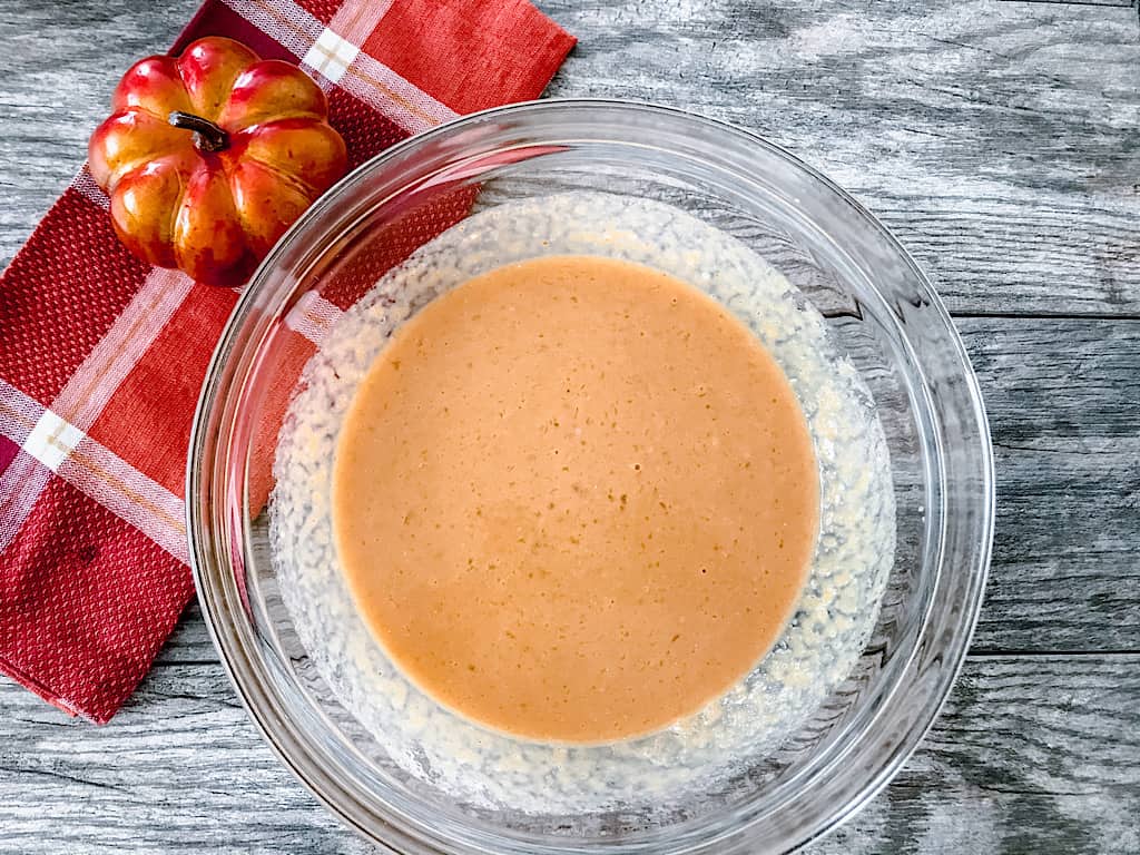 In a separate bowl, whisk together the eggs, brown sugar, pumpkin purée, milk, butter, and vanilla extract.