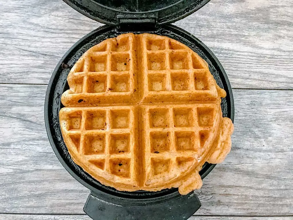 Scoop batter onto a preheated waffle iron sprayed with cooking spray and bake until golden.