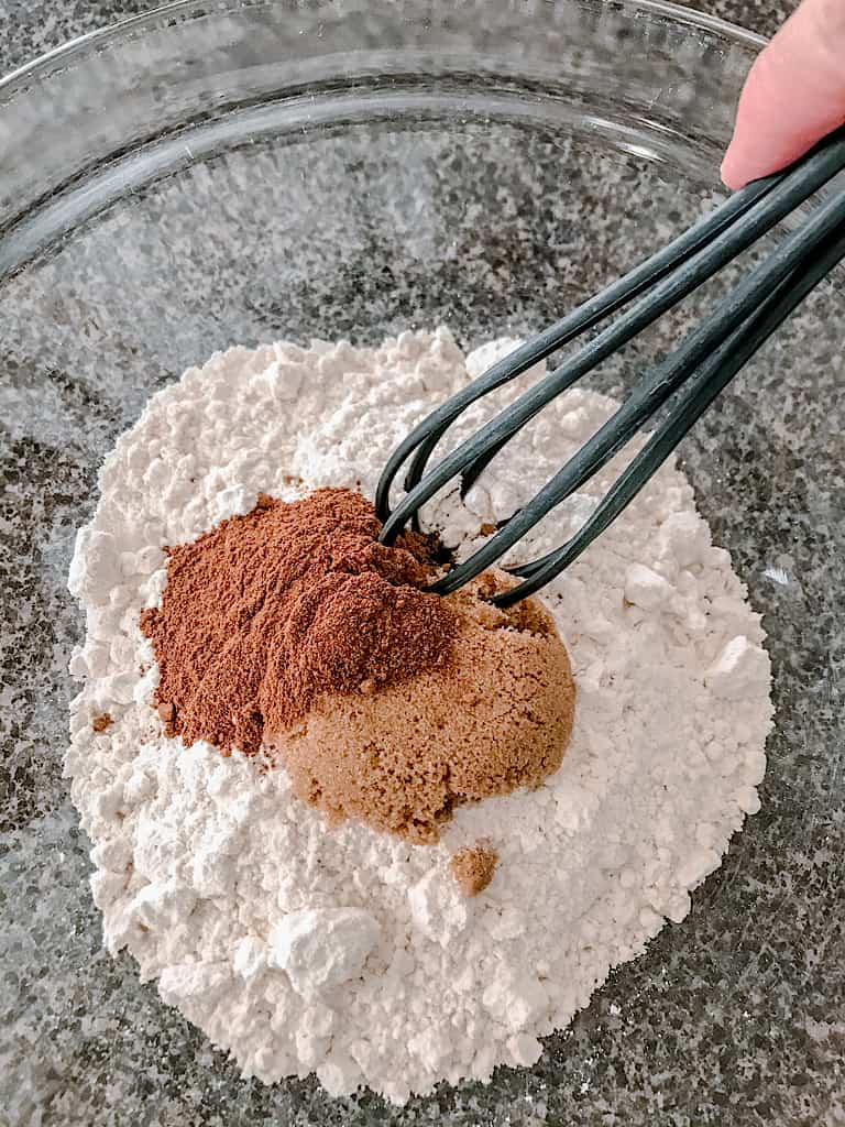 In a large mixing bowl, whisk together the pancake mix, brown sugar, and pumpkin spice.