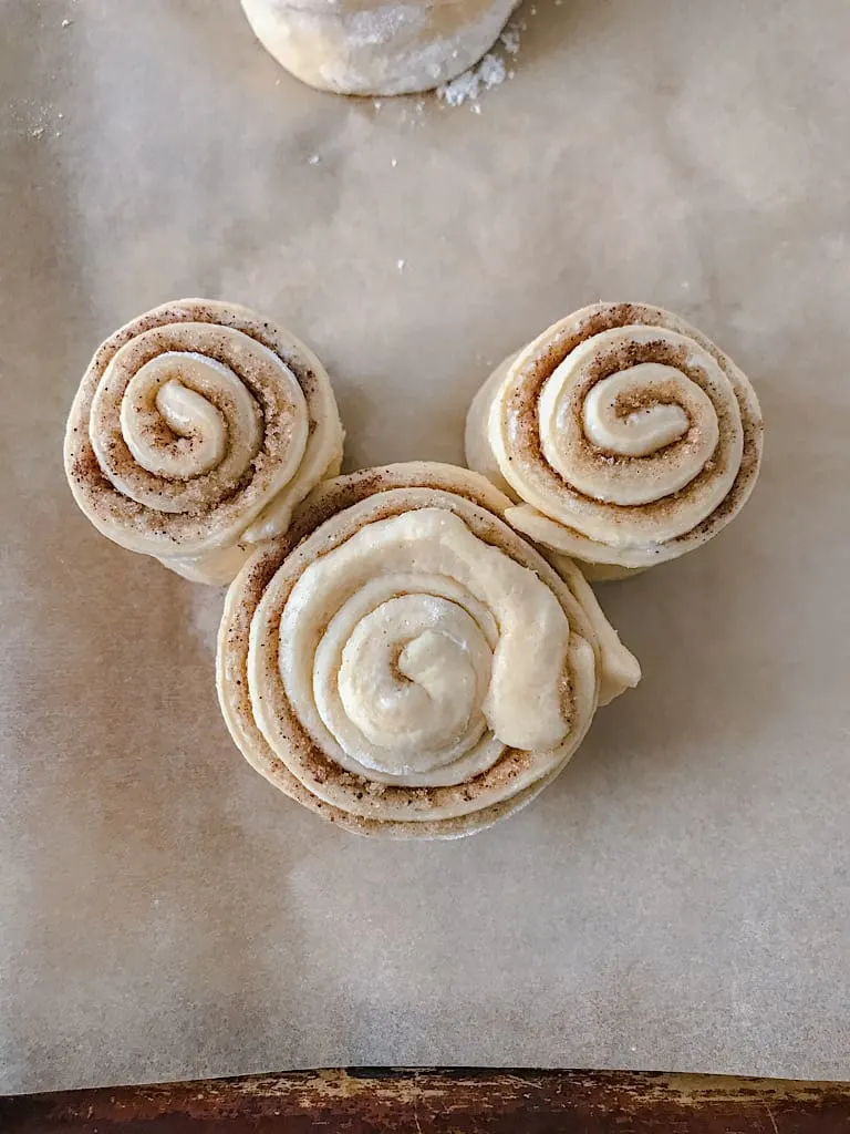 An unbaked Mickey Mouse Cinnamon Roll