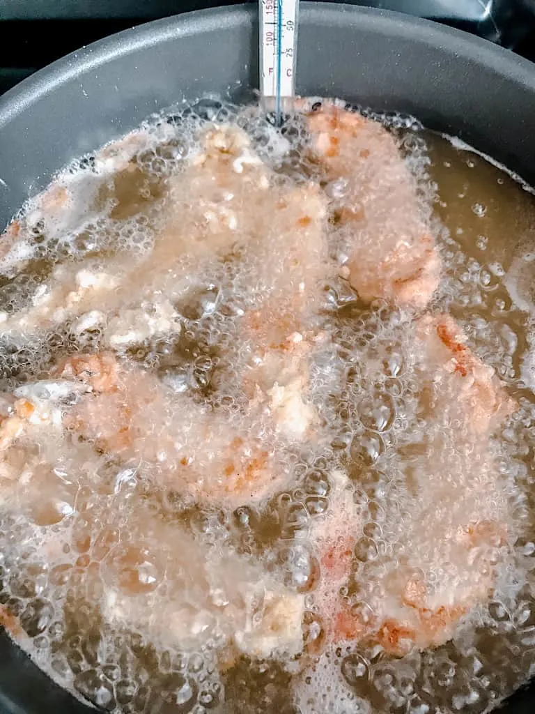 Deep fry the chicken for 6-7 minutes or until it is cooked through.