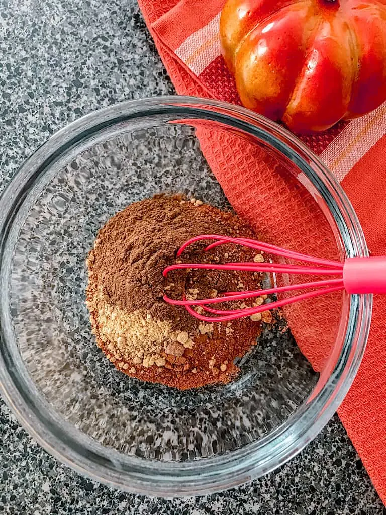 Use a whisk to mix all of the spices together.