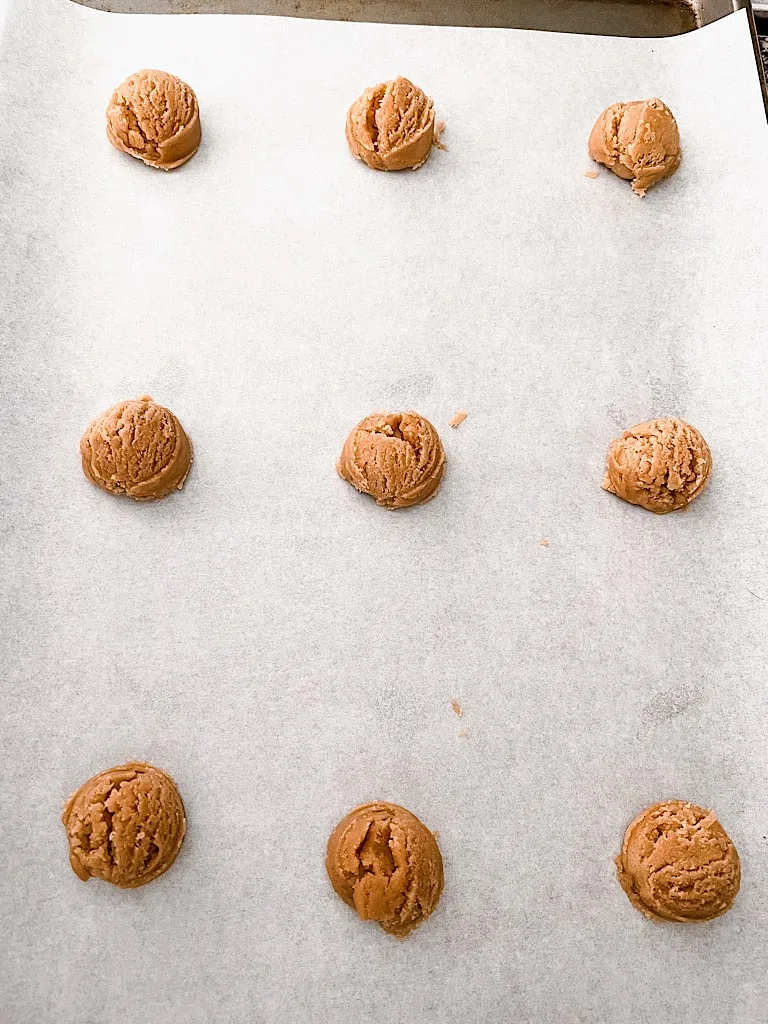 Drop Cookies: Use a cookie scoop to drop cookie dough balls onto a baking sheet lined with parchment paper about 2 inches apart.