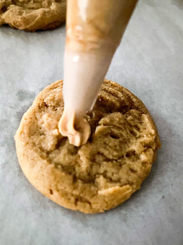 Frost the cookie butter sugar cookies with the cookie butter frosting!