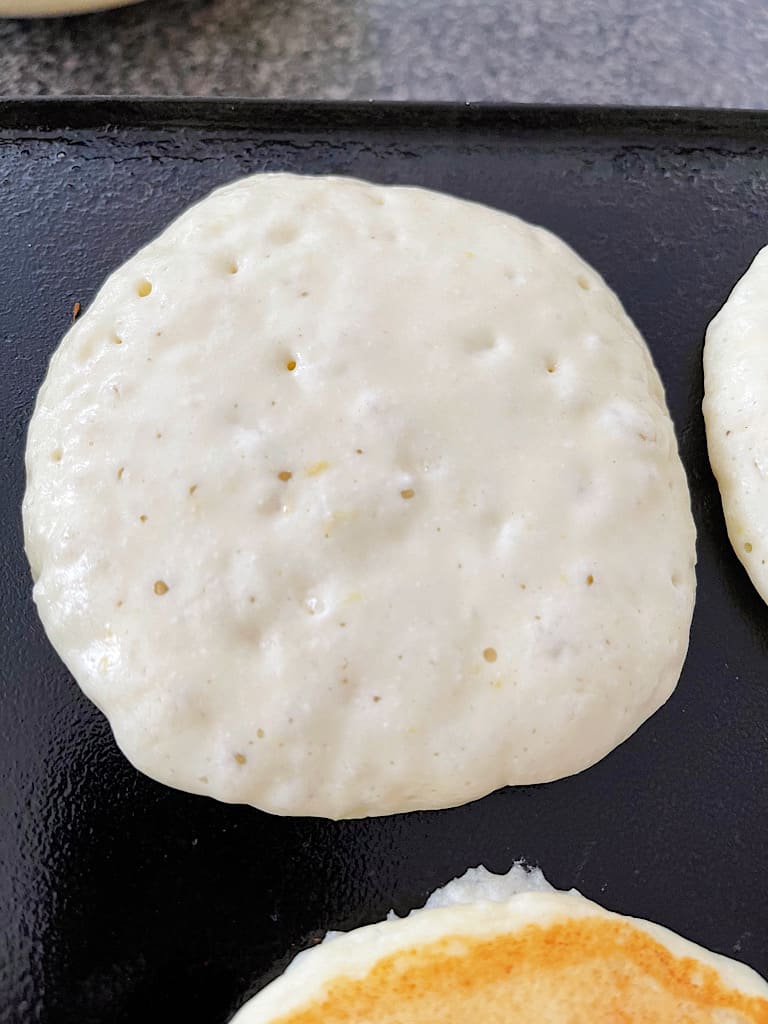 When bubbles begin to appear on the pancakes, flip them over and cook on the other side for 2-3 minutes.