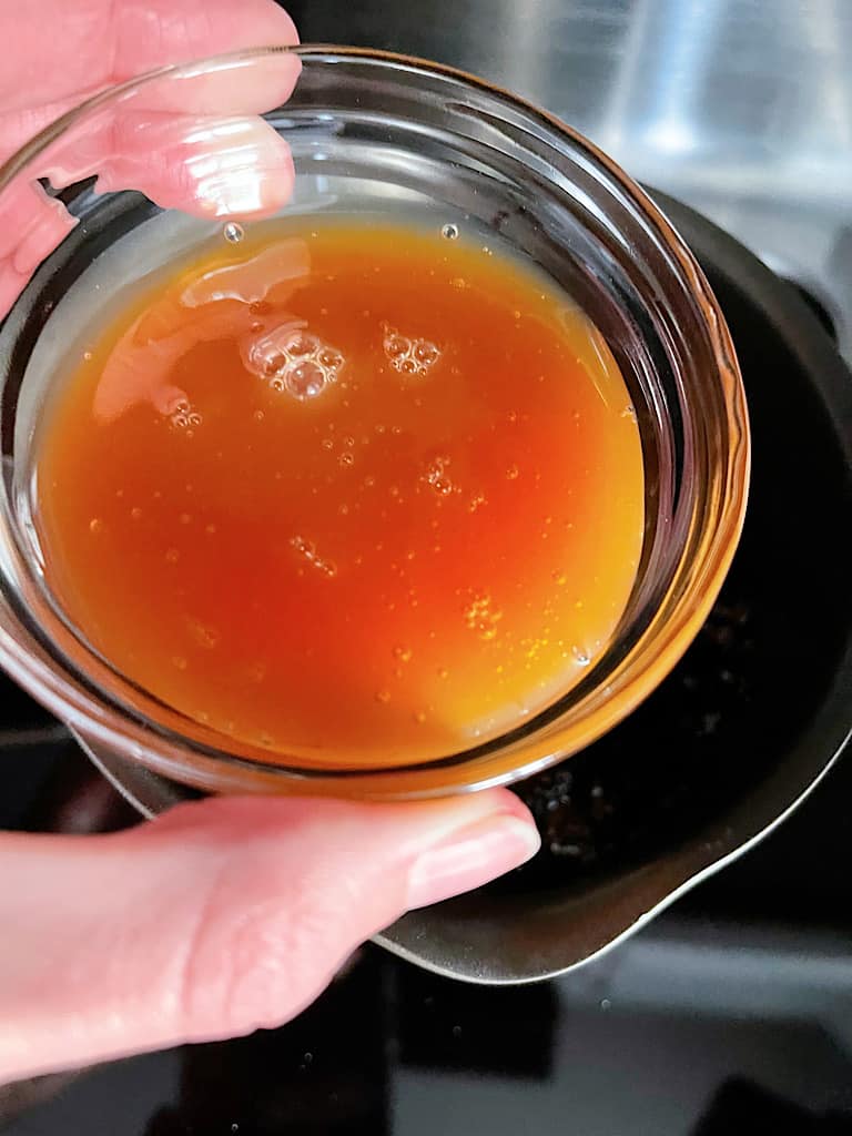 Stir in the caramel sauce and simmer for 1 minute.