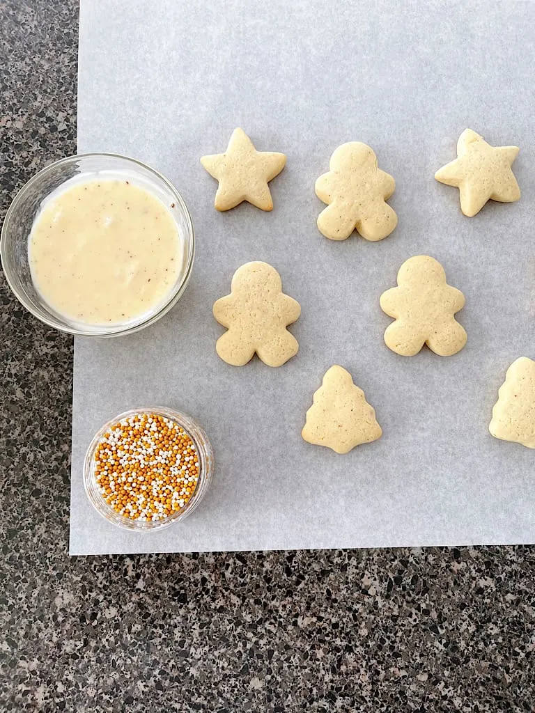 Eggnog icing, sprinkles, and eggnog sugar cookies