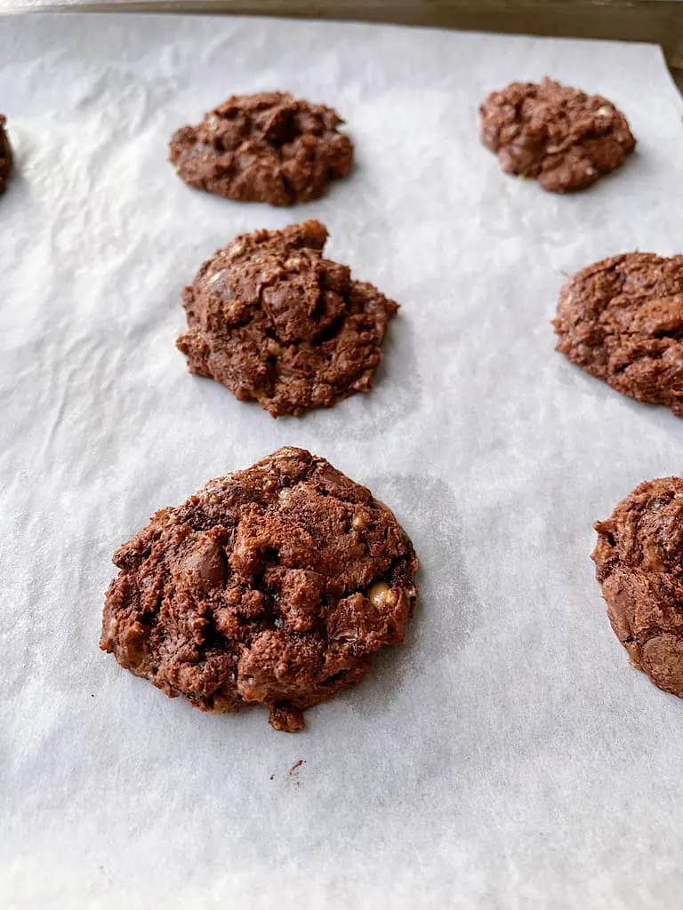 Bake at 375 Degrees for 9-11 minutes and allow them to rest for at least one minute on the cookie sheet.