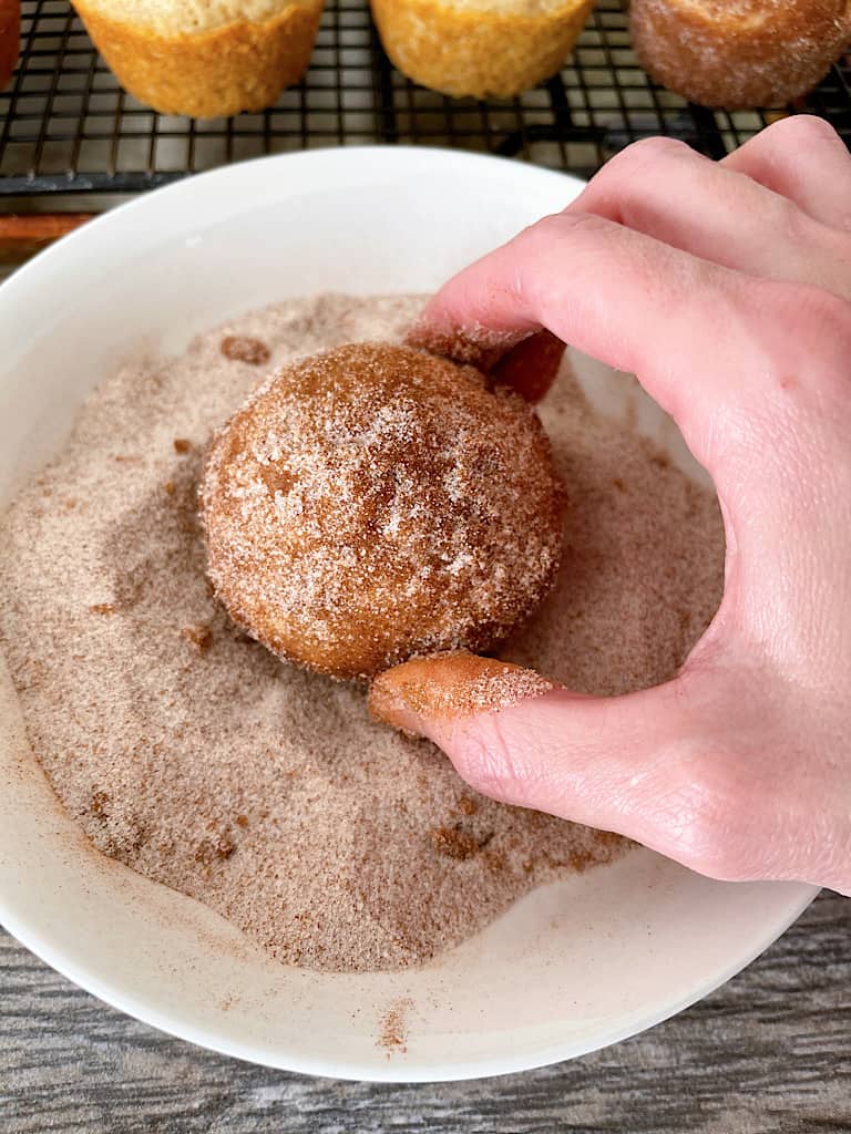 Dip each muffin in butter then in the cinnamon sugar mixture, coating completely.