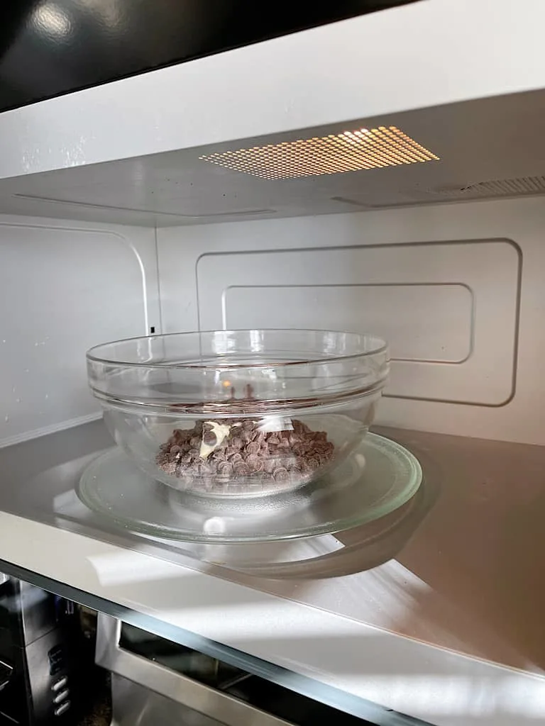 Remove from the microwave and stir. Microwave again at 50% power for 30 seconds, then remove to stir.