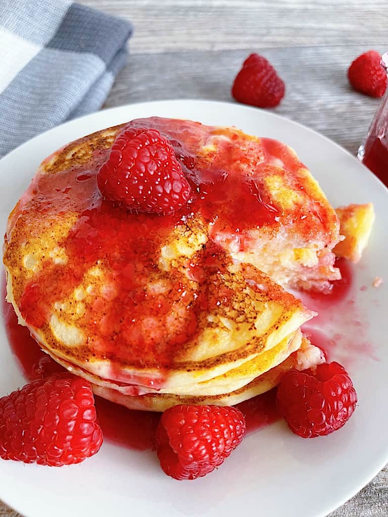 Fresh raspberry syrup on pancakes