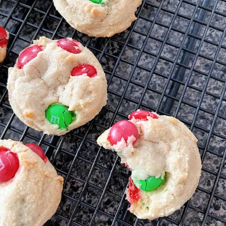 Cream Cheese Cookies with M&Ms on a cooling rack