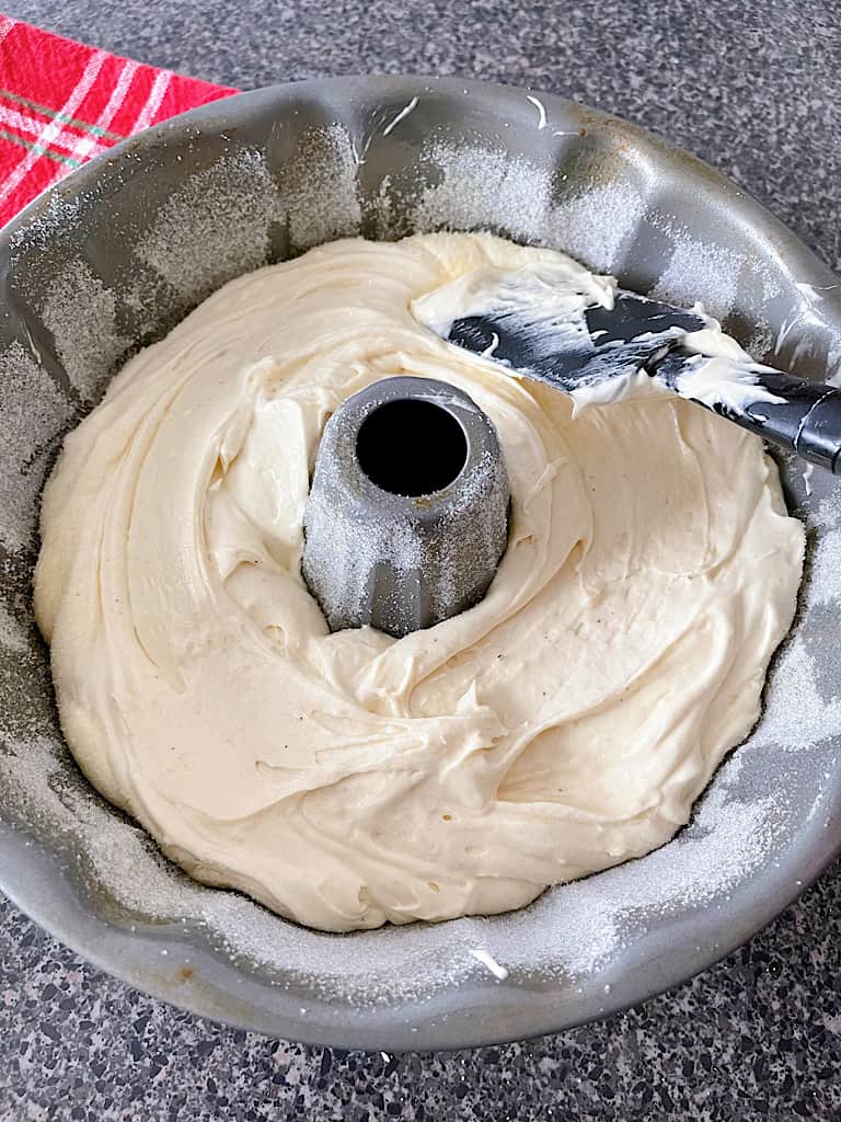 Pour the eggnog cake batter into the bundt pan and bake at 350 degrees for 35-40 minutes or until a toothpick inserted comes out clean.