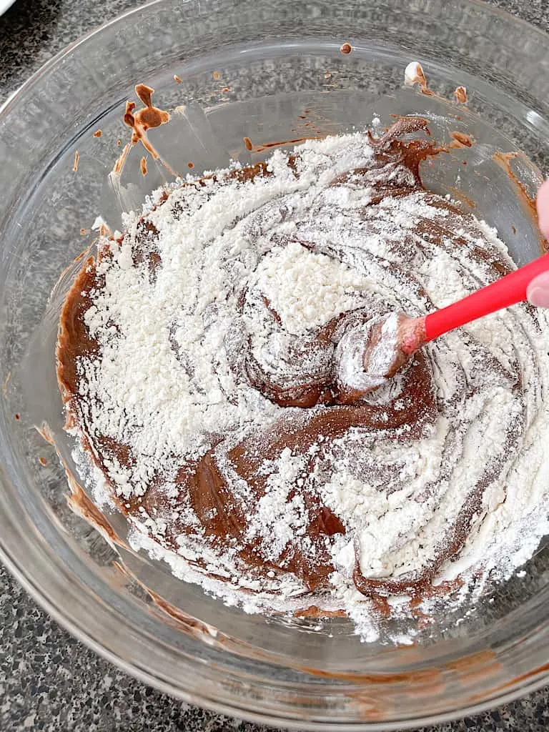 Stir the dry ingredients into the chocolate mixture.