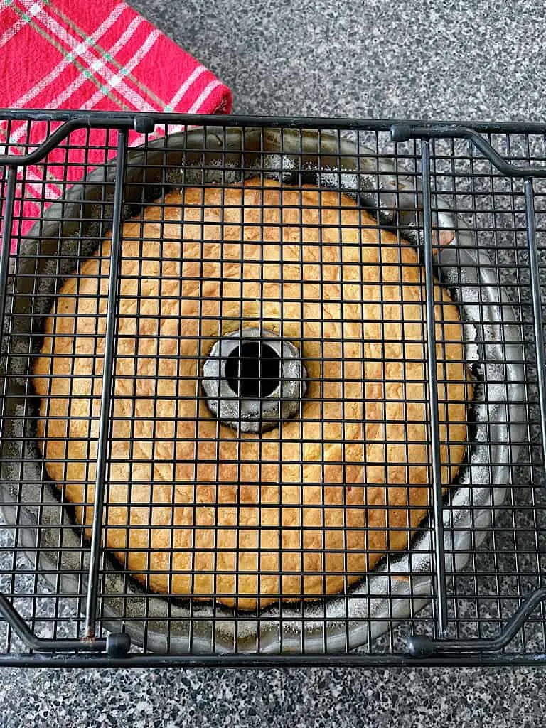 Place a cooling rack over the pan and invert to remove the cake from the pan.