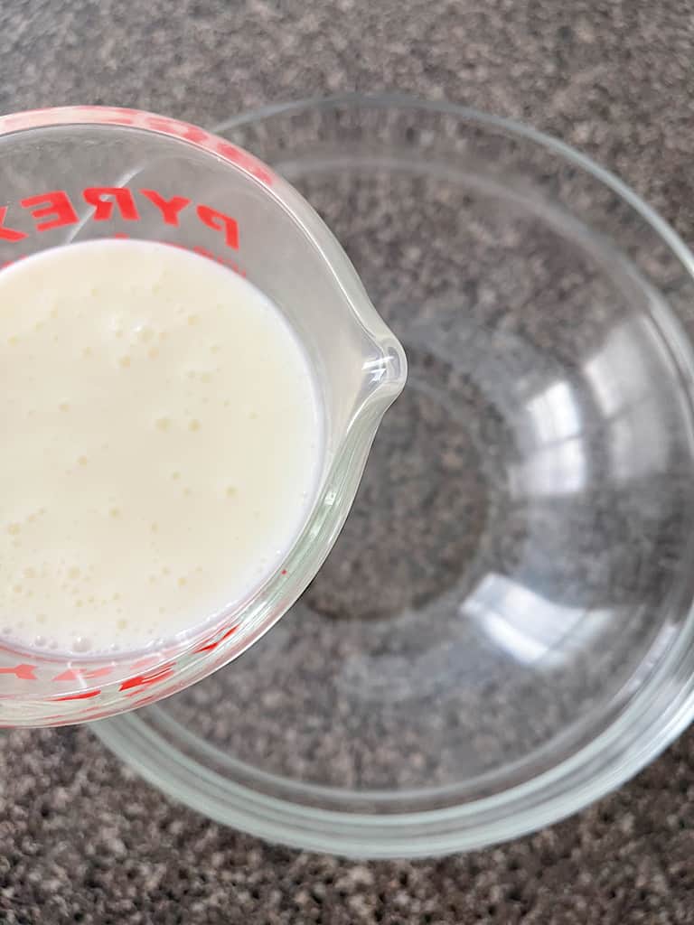 Whisk together the Buttermilk, eggs, and vanilla extract in a separate mixing bowl.