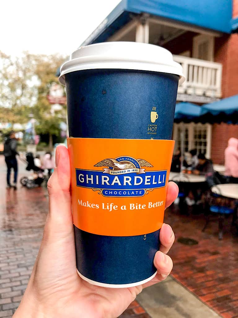 A cup of Ghirardelli Sea Salt Caramel Hot Cocoa