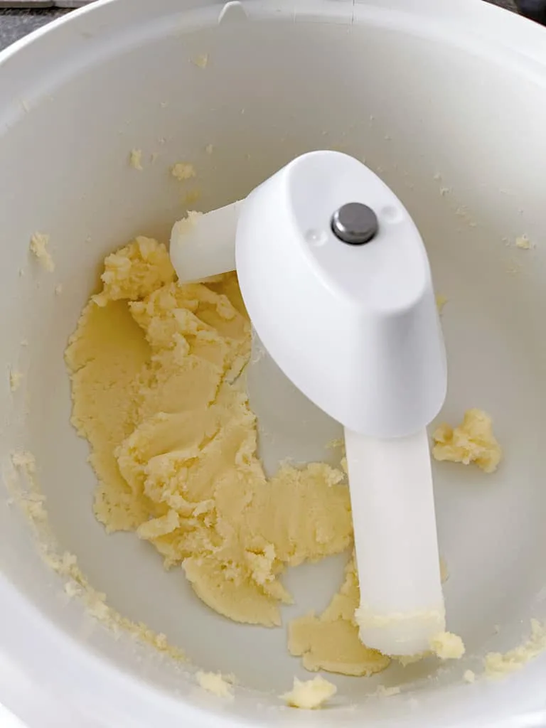 Add the softened butter and sugar to the bowl of a stand mixer. Mix until light and fluffy.