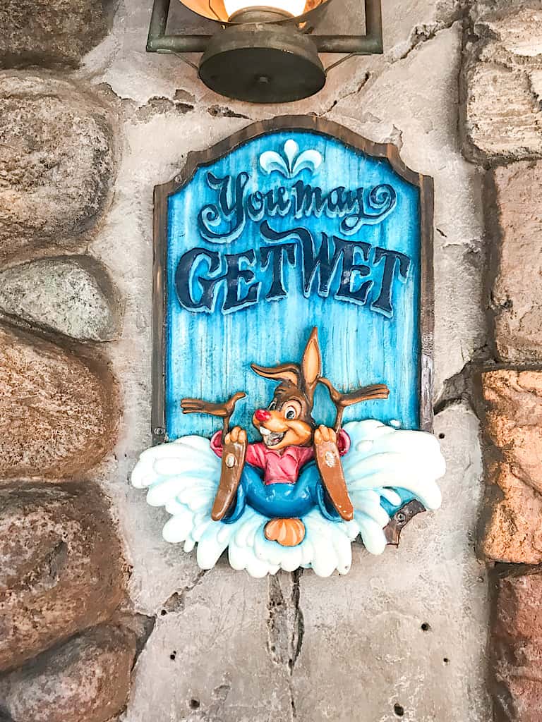 A sign from the queue of Splash Mountain that says You May Get Wet!