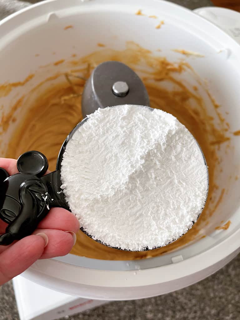 Add the powdered sugar, one cup at a time, mixing in between.