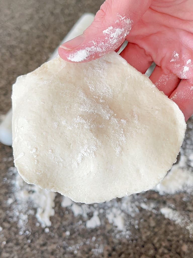 A circle of biscuit dough.