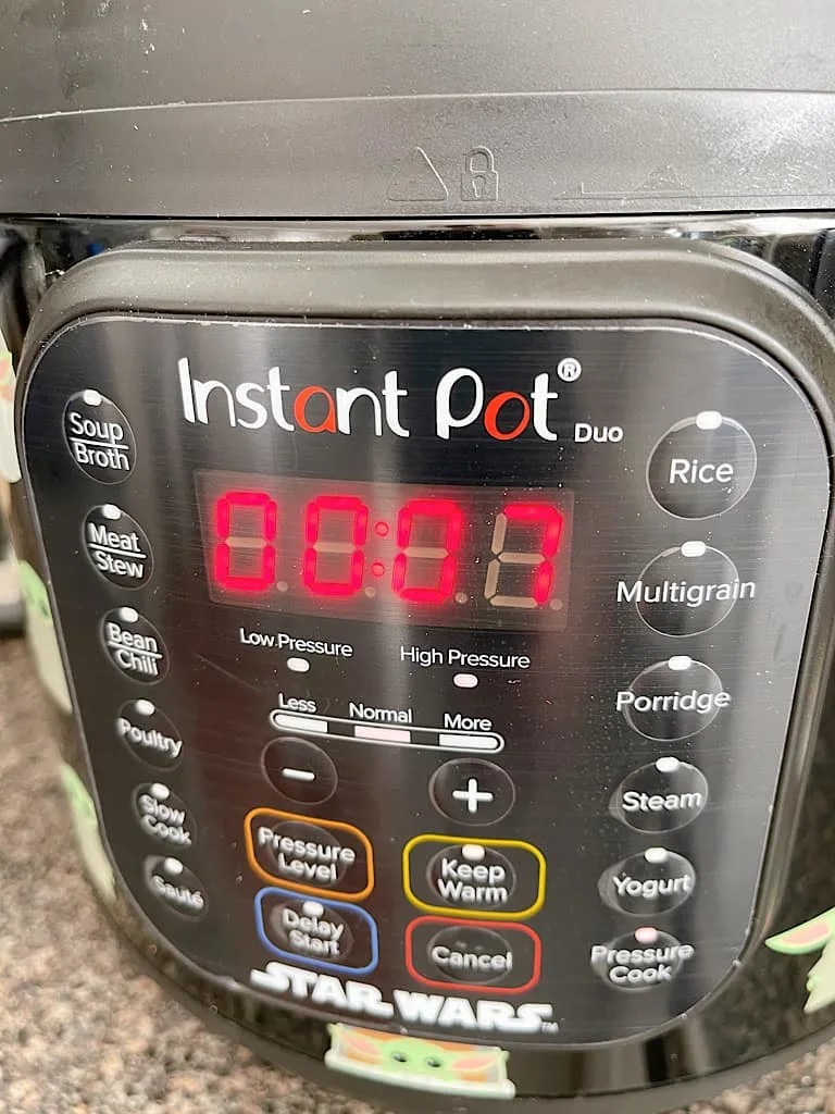 An Instant Pot set to 7 minutes.