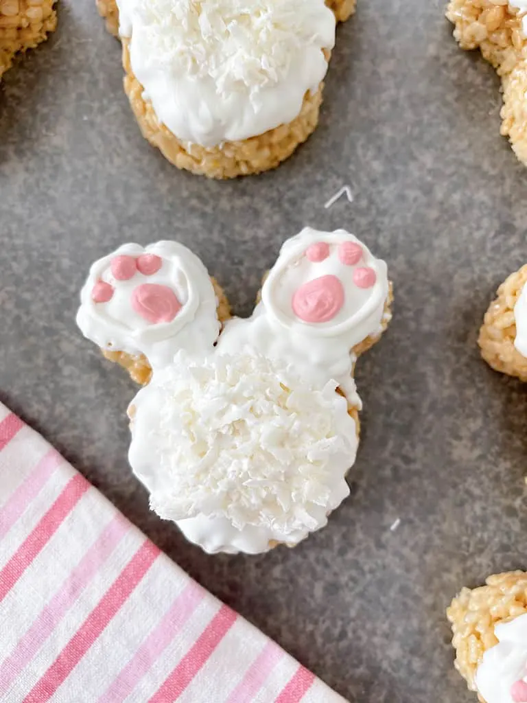 A bunny tail rice Krispie Treat with a pink and white towel.