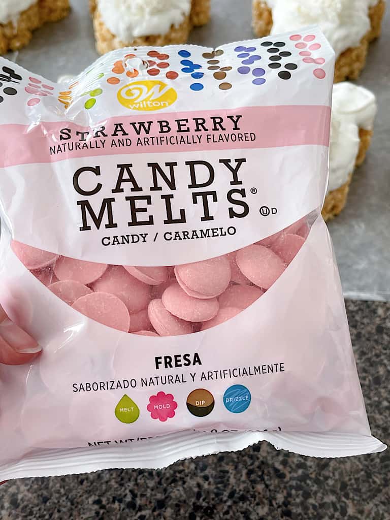 A bag of pink Wilton Candy Melts.