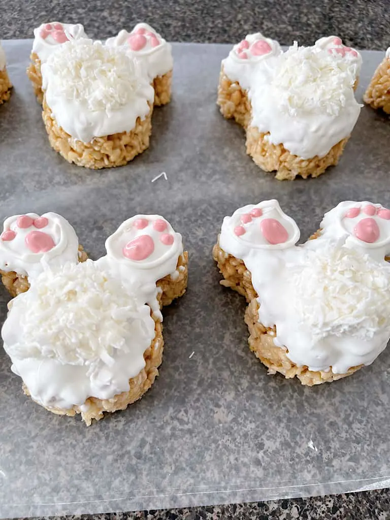 Rice Krispie Treats shaped like Mickey Mouse made to look like bunny tails for Easter.