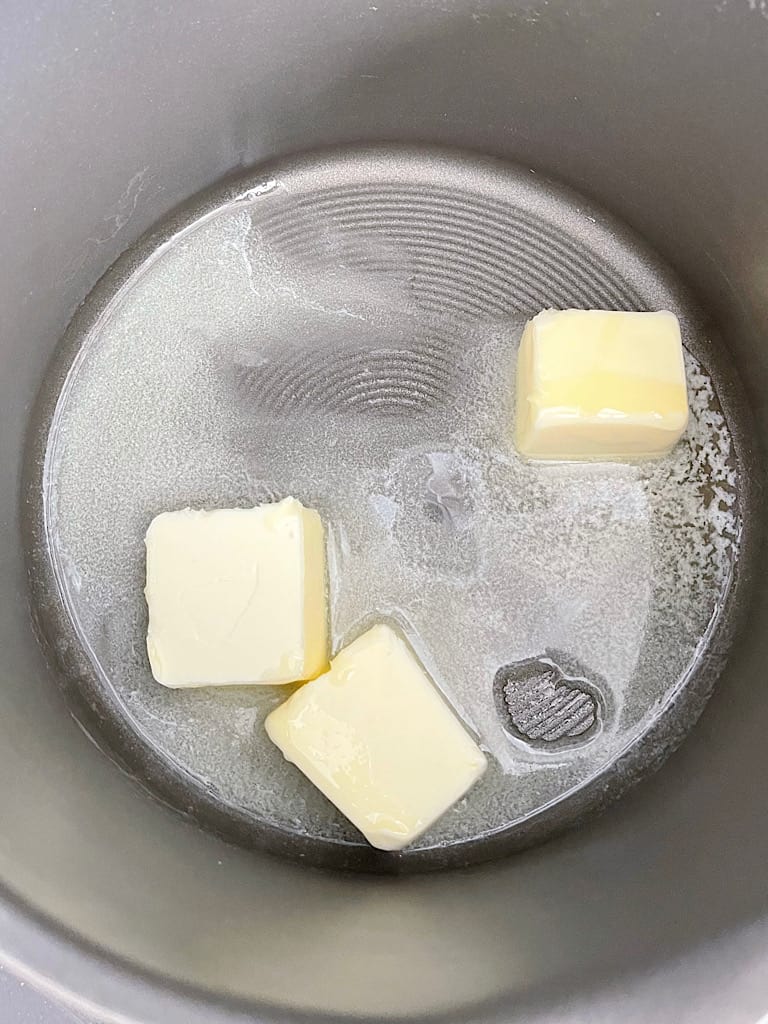 Butter melting in a pan for Rice Krispie Treats.