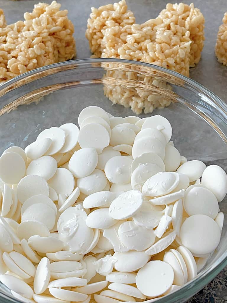 A bowl of white candy melts.