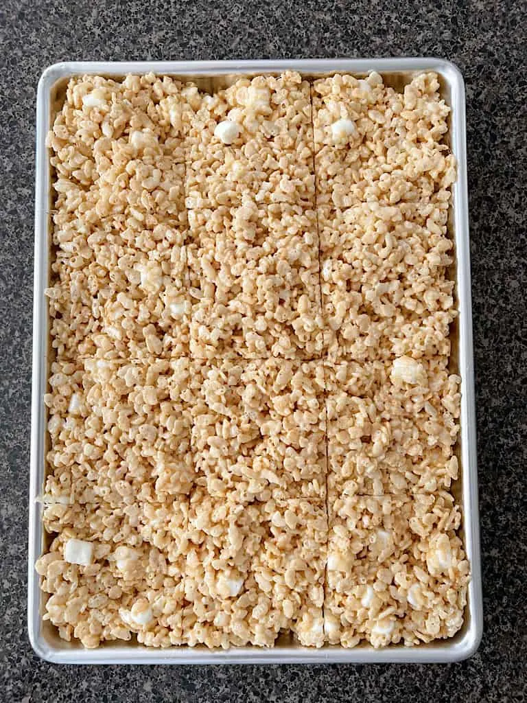 A pan of Rice Krispies Treats cut into squares.