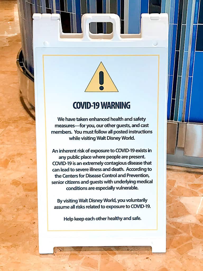 Covid-19 warning sign at Disney World.