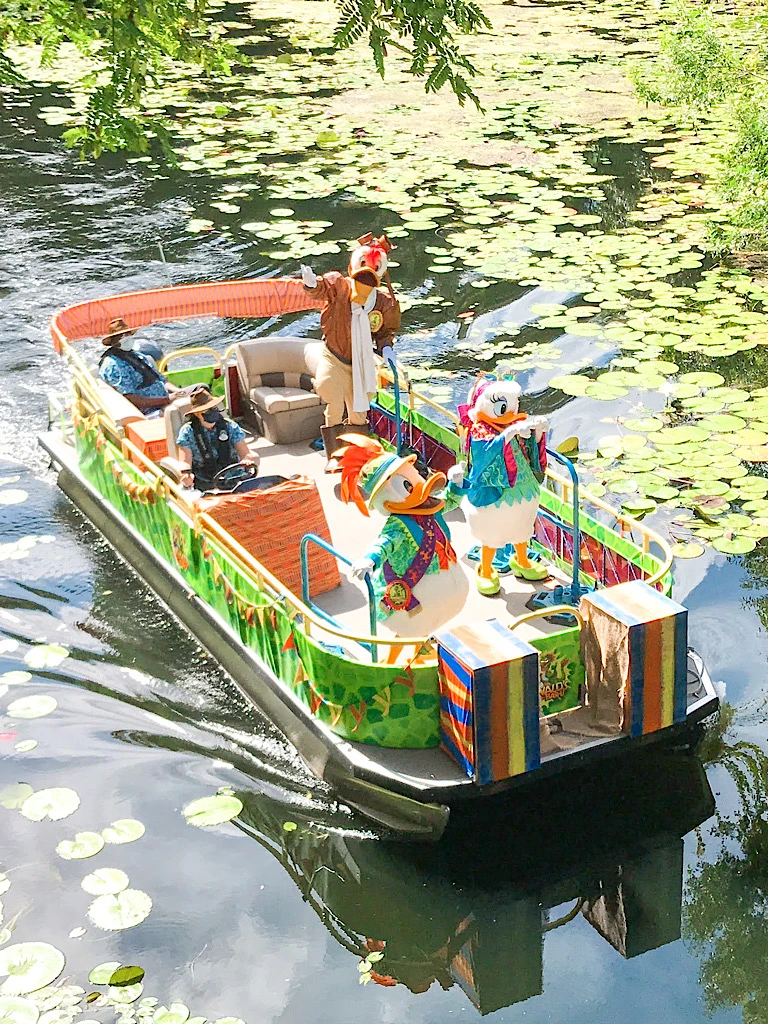 Disney characters on a boat at Animal Kingdom.
