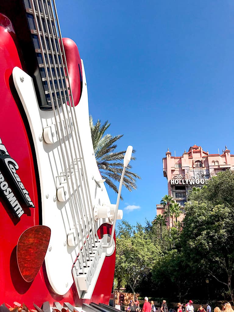 A view of the giant guitar in front of Rock 'n' Roller Coaster and the top of the Tower of Terror at Hollywood Studios.