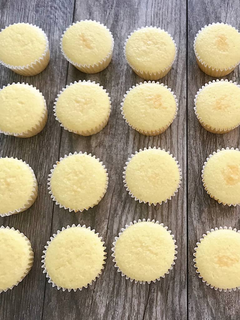 Four rows of pineapple cupcakes.