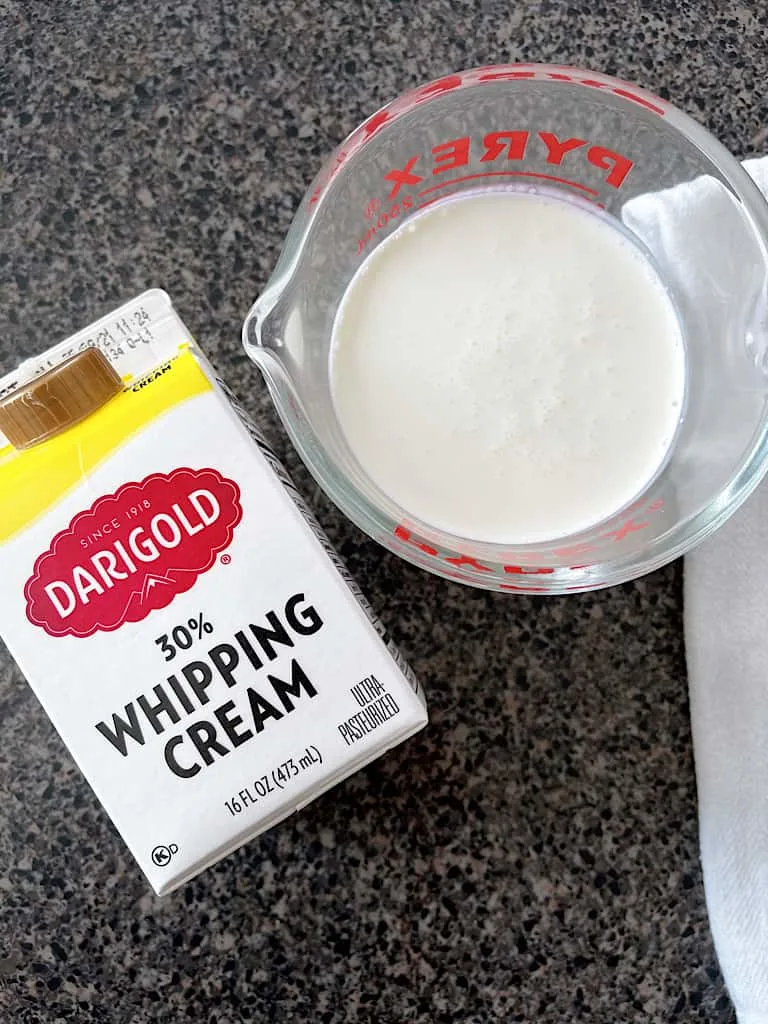 A carton of heavy whipping cream.